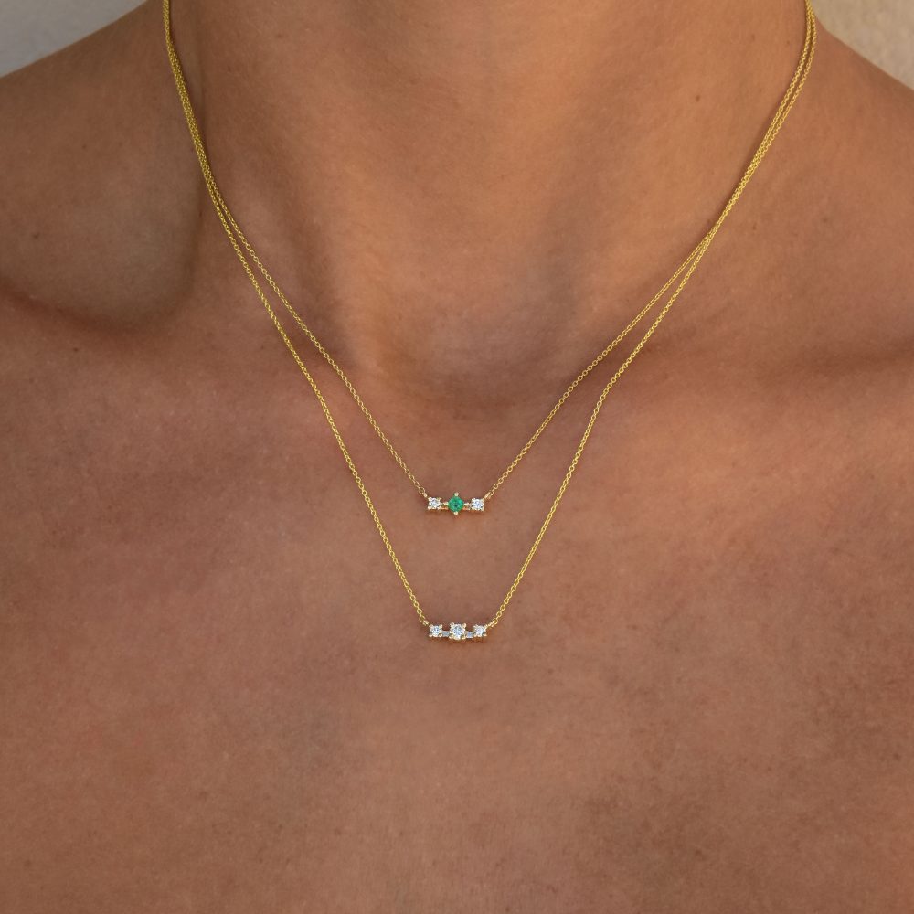 gaia necklace white diamonds emeralds gold
