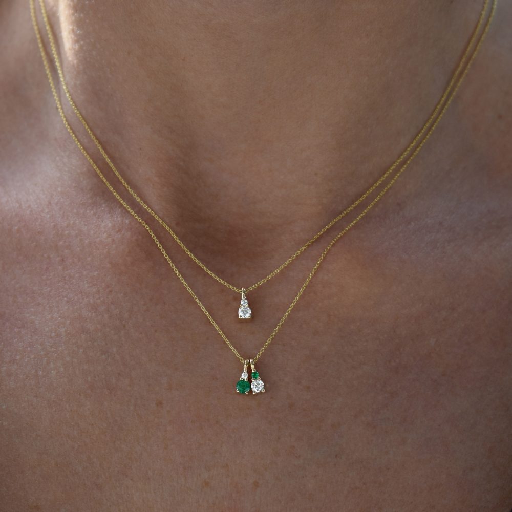 gia double necklace white diamonds emeralds gold